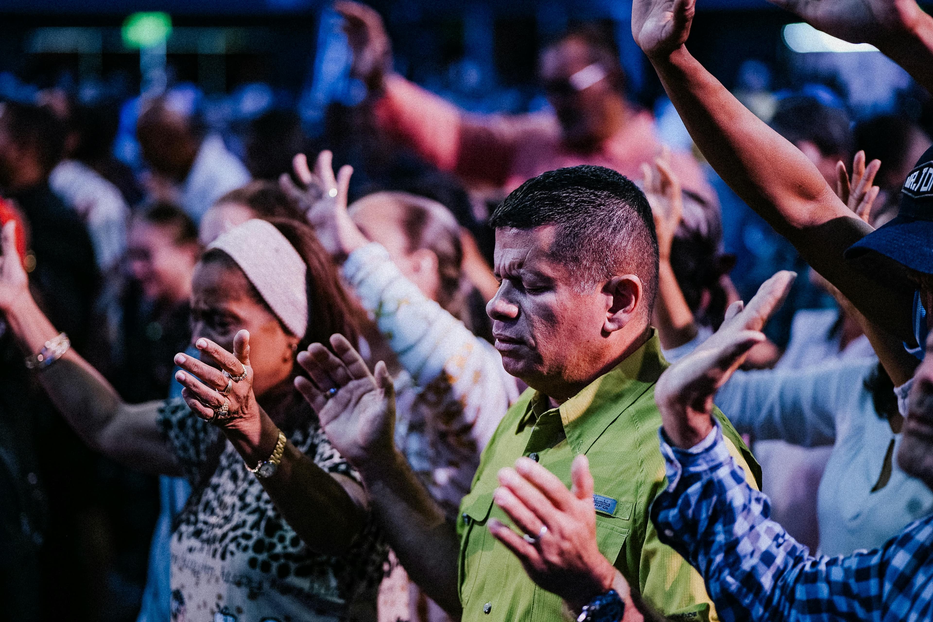 A modest church gathering in a neighborhood street setting.