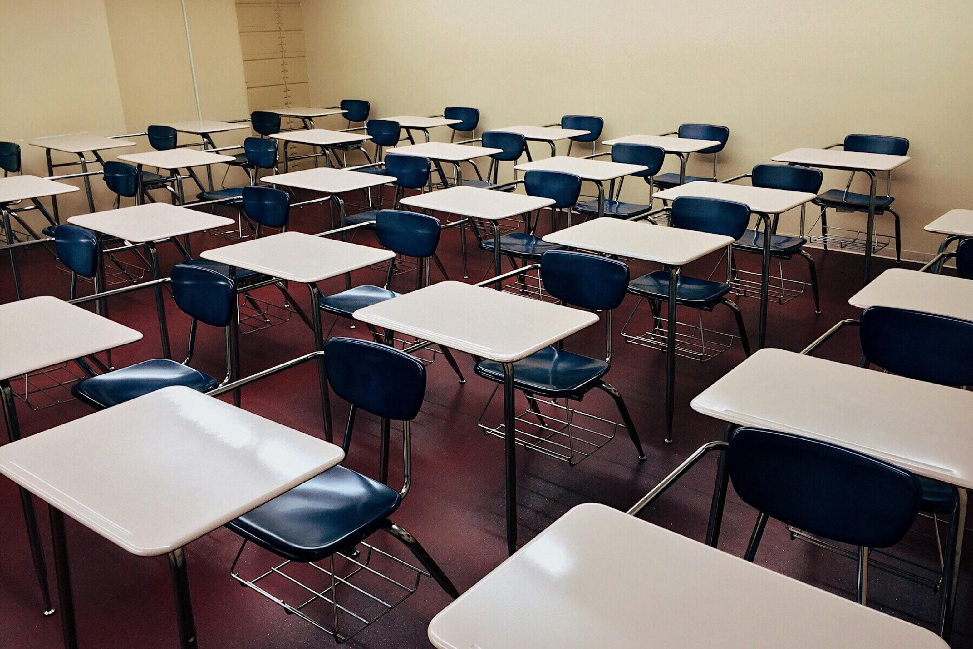 Teenagers seated in a church classroom.